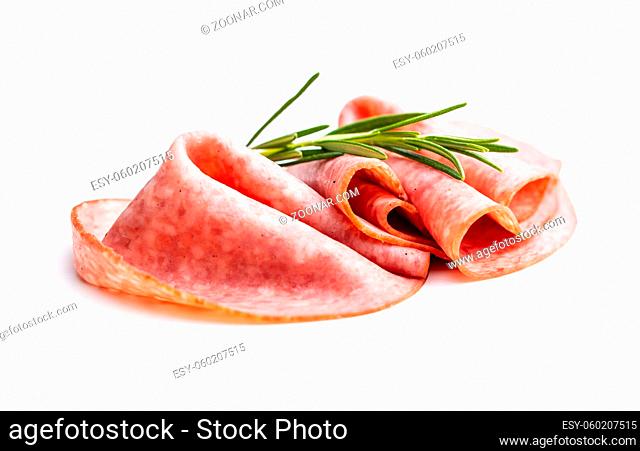 Sliced smoked salami isolated on white background