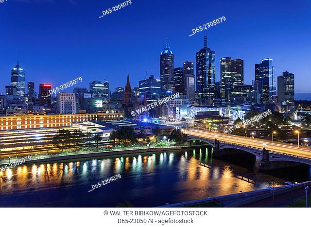 Australia, Victoria, VIC, Melbourne, skyline with Yarra River and Princess Bridge, elevated view, dusk