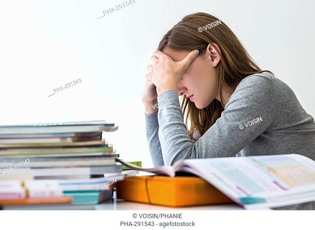Teenage girl revising exams