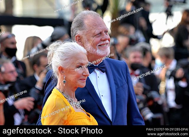06 July 2021, France, Cannes: Taylor Hackford and Helen Mirren attend the opening ceremony and the premiere of the opening film ""Annette"" during the 74th...