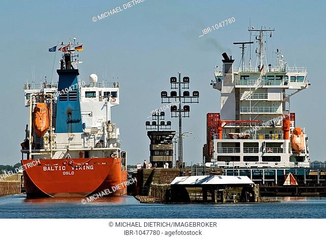 Close-up of container ships chanelling into the Holtenau floodgate, Kiel, Schleswig-Holstein, Germany, Europe