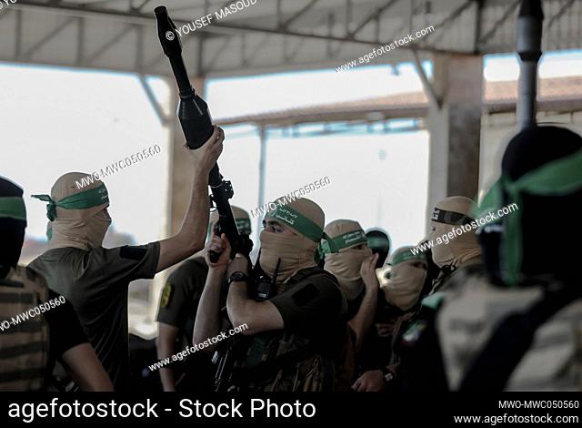 Armed men from the Izz al-Din al-Qassam Brigades, the military wing of Hamas, participate in a military parade in Gaza City. Palestine
