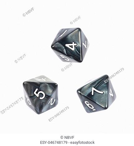 Roleplaying black polyhedral octahedron gaming plastic dice isolated over the white background, set of three different foreshortenings