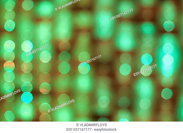 Green Background of defocused glittering lights
