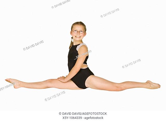 10 year old caucasian girl in gymnastics poses