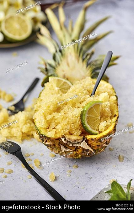 Pineapple granita dessert served in pineapple boat