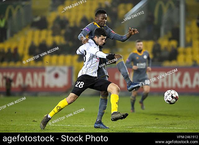Lokeren's Amine Benchaib and OHL's Aboubakar Keita fight for the ball during a soccer game between Sporting Lokeren and OH Leuven