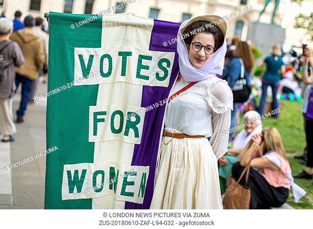 June 10, 2018 - London, London, UK - London, UK. People gather in Parliament Square after thousands of people marched through central London wearing green