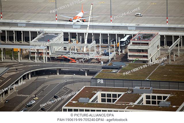 12 June 2019, Brandenburg, Schönefeld: Construction work on the north terminal of the capital airport BER in Schönefeld. Construction of the Berlin Brandenburg...