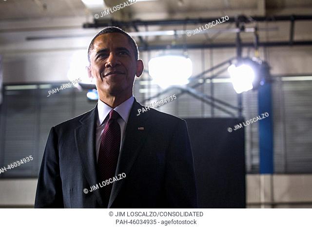 United States President Barack Obama walks off stage after delivering remarks on the ConnectED Initiative at Buck Lodge Middle School in Adelphi, Maryland, USA