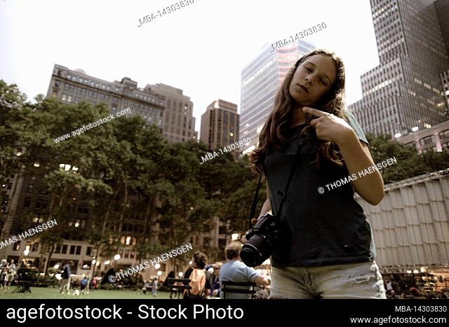 Midtown SOUTH, New York City, NY, USA, Young Girl posing in Bryant Park
