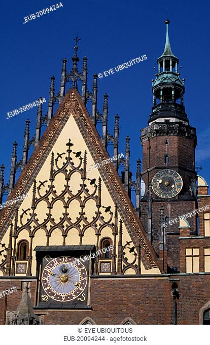 Wroclaw Town Hall dating from the fourteenth century. Part view of exterior with decorative gable astronomical clock and clock tower