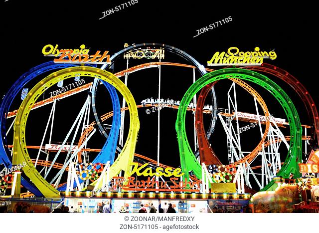 MUNICH, GERMANY - SEPTEMBER 25: Roller coaster at the Oktoberfest in Munich, Germany on September 25, 2013. The Oktoberfest is the biggest beer festival of the...