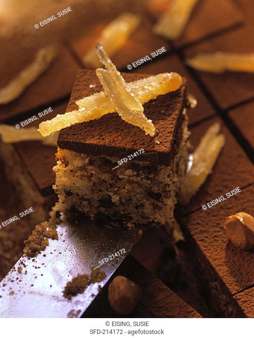 Chocolate & ginger squares with candied ginger on knife (1)