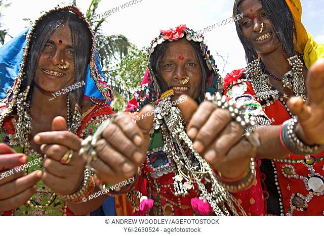 Rajasthani costume women sing and dance during Holi spring festival of colours Goa India