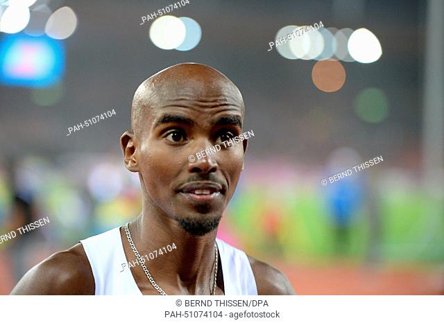 Winner Mohamed ""Mo"" Farah from Great Britain reacts after winning the men's 10'000m final race at the European Athletics Championships 2014 at the Letzigrund...