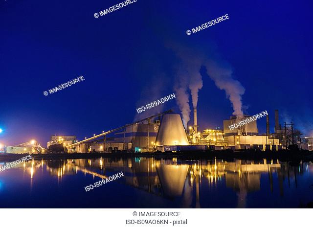 View of pulp mill on waterfront at night, Strait of Juan de Fuca, Port Angeles, Washington State, USA