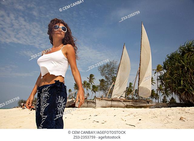 Woman posing at Nungwi beach, Zanzibar, Tanzania, East Africa
