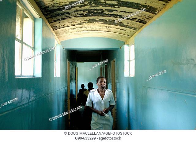 A nurse walks the hallway from the Howard Hospital Emergency to the Male Ward. The eighty year old salvation Army operated facility sometimes shows its age