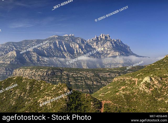 Montserrat mountain seen from Sant Salvador de les Espases with the Congost del Cairat below (Barcelona, Catalonia, Spain)