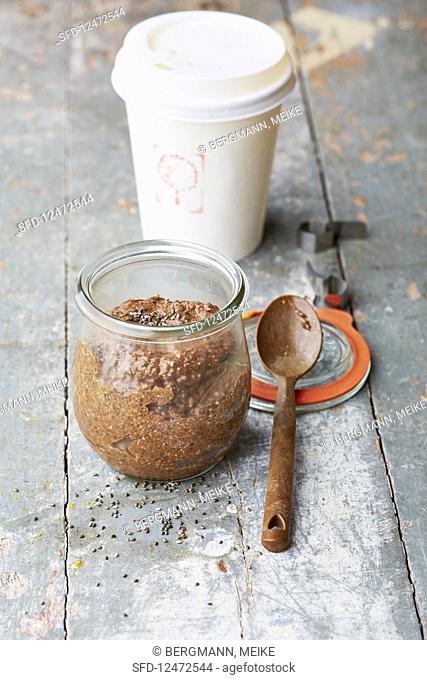 Chocolate coffee cream with chia seeds in a jar