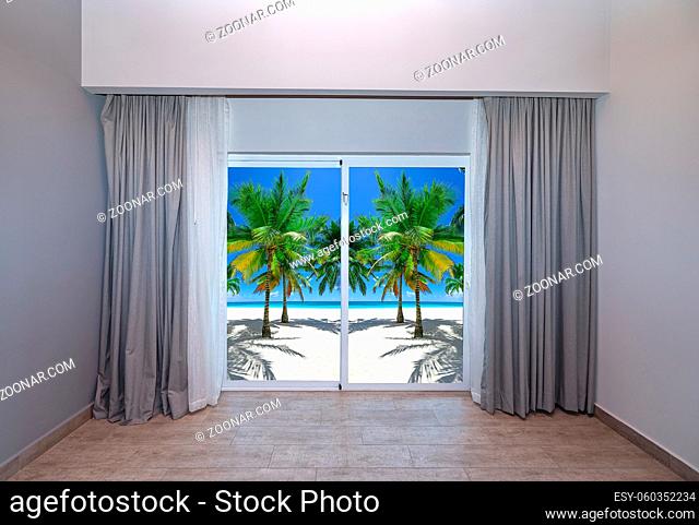 large glass door in the room overlooking the paradise beach