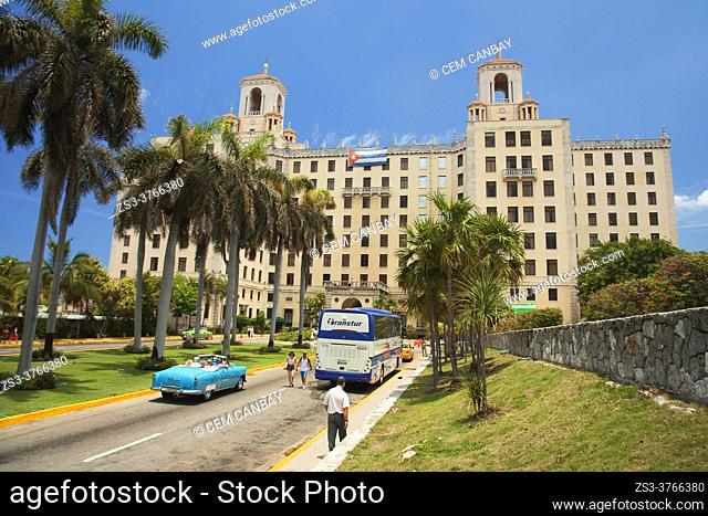Old American car used as taxi in front of the Hotel Nacional at Vedado district, Havana , La Habana, Cuba, West Indies, Central America