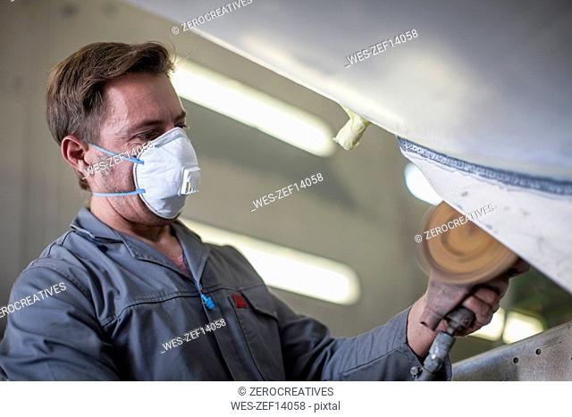 Industrial worker wearing protective mask