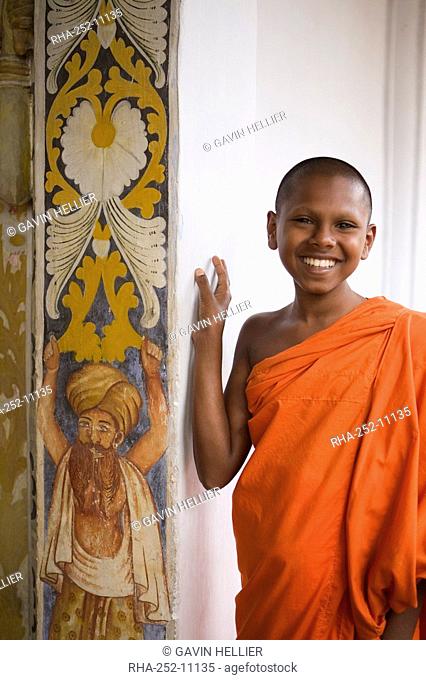 Portrait of a novice Buddhist monk, Kandy, Sri Lanka, Asia