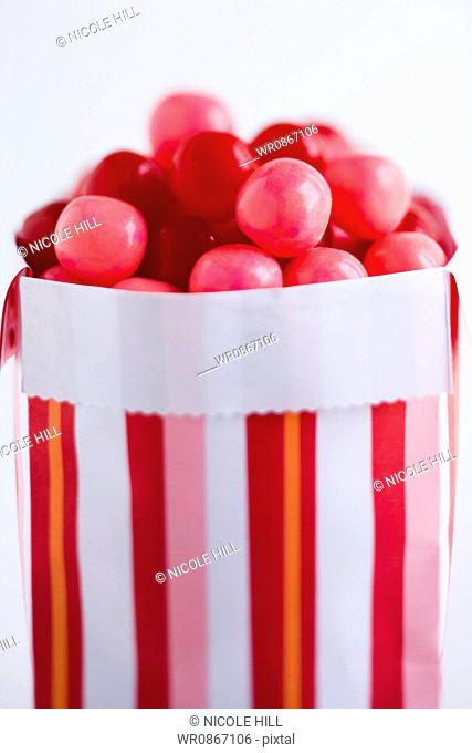 Candy box with pink and red candies