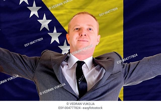 happy businessman because of profitable investment in bosnia her