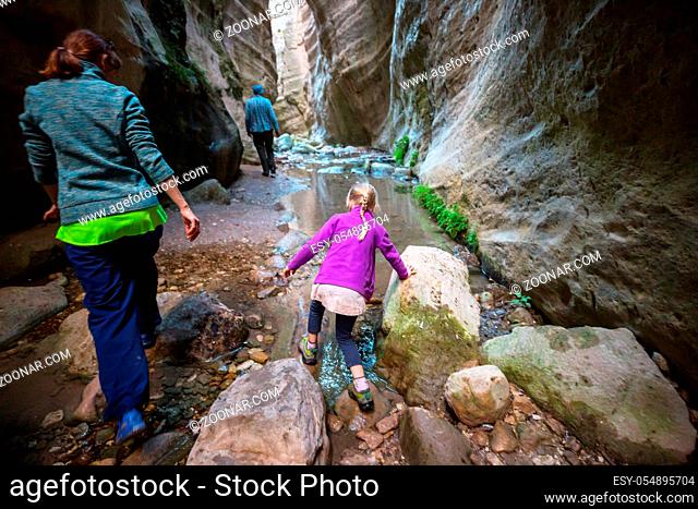 Tourist in Avakas Gorge. Paphos District, Cyprus. Famous small canyon in Sounh Cyprus