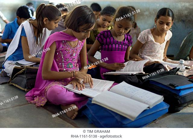 Indian children learning English at Rajyakaiya School in Narlai village, Rajasthan, Northern India