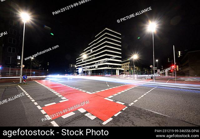 19 December 2023, Lower Saxony, Hanover: Cars pass the newly built medical center of the Lower Saxony Medical Association