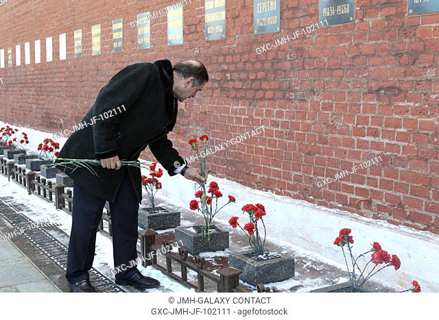 During a traditional tour of Red Square in Moscow March 7, Expedition 3536 Soyuz Commander Pavel Vinogradov laid flowers at the Kremlin Wall where Russian space...