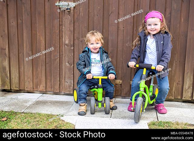 Children with balance bikes