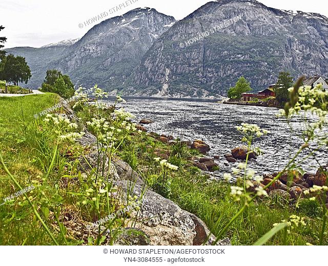 The Eio River empties into the Eid Fjord at the town of Eidfjord, Norway. The Eio river is only 1. 3 miles long and runs from Lake Eidfjord into the Eid Fjord...