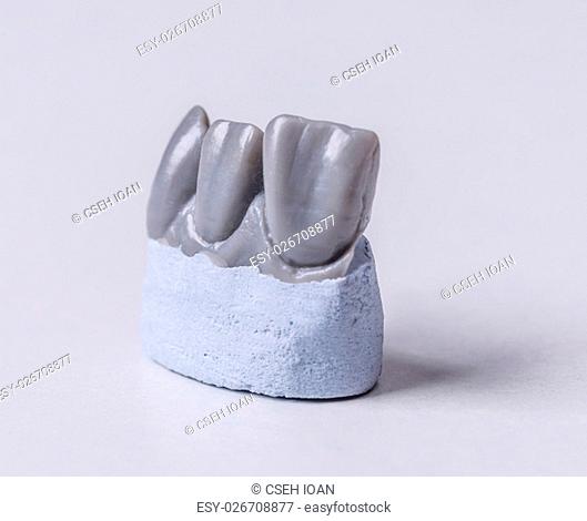 Artificial tooth, wax model on white background