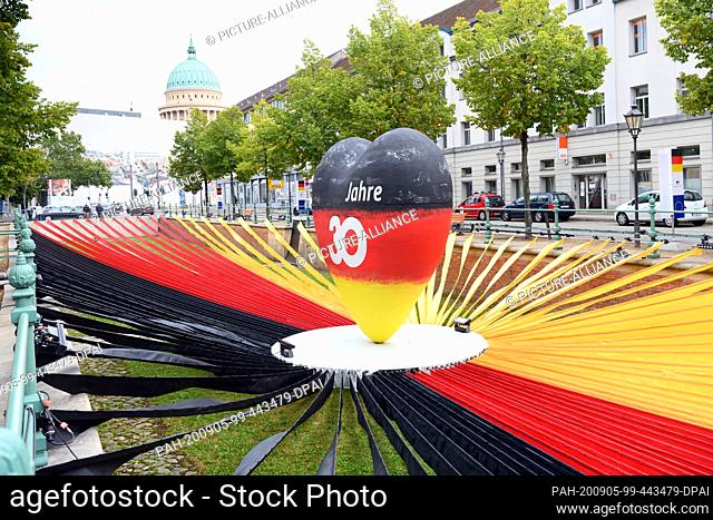 05 September 2020, Brandenburg, Potsdam: A black-red-gold heart in the exhibition ·Weg zur Einheit· during the German 30 years of unity celebration