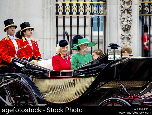 Queen Camilla, Catherine, Princess of Wales Prince George of Wales and Princess Charlotte of Wales and Prince Louis of Wales leaves at Buckingham Palace in...