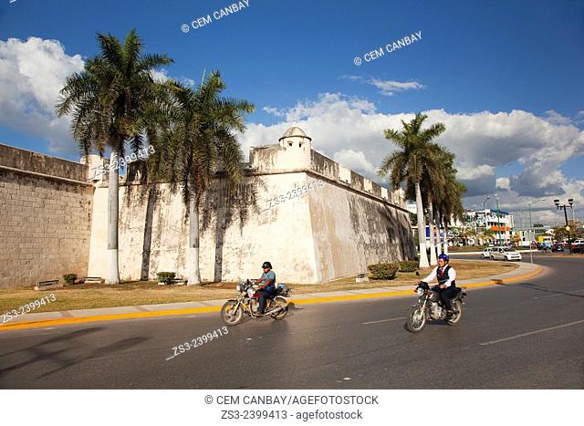 Motorcyclists in front of Baluerte de Sn. Pedro, historic fort at the center of Campeche, Campeche, Yucatan, Mexico, Central America