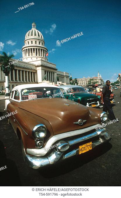 Old American Car in front of the Capitol in Havana