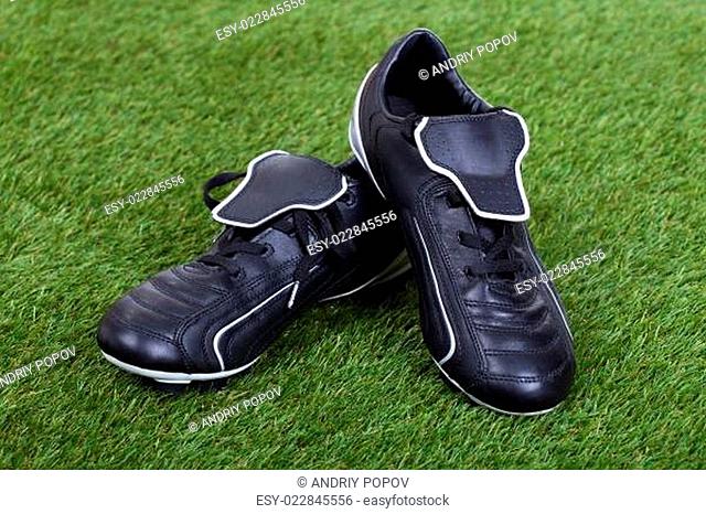 Soccer Shoes On Grass Field