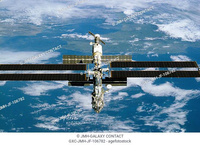 This high-angle view is one of a series of digital still camera photographs showing the International Space Station (ISS) during a fly-around by the Space...
