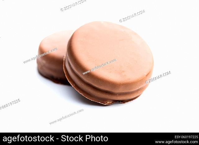 Biscuits with chocolate icing isolated on white background