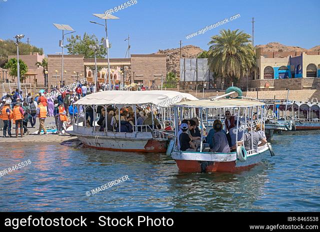 Tour boats with tourists, departure to Philae Island, Aswan, Egypt, Africa