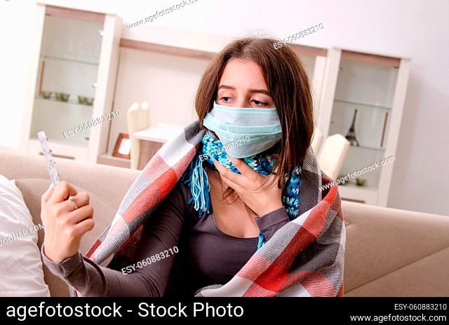 Sick young woman suffering at home