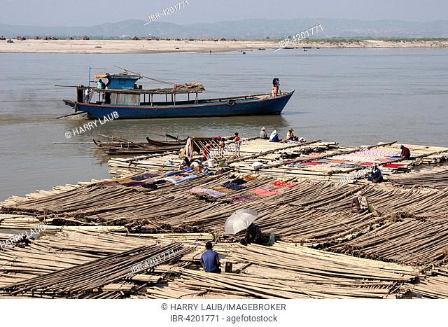 Life by the river, bamboo rafts in a row on the Irrawaddy River, also called the Ayeyarwaddy, Mandalay, Division Mandalay, Myanmar
