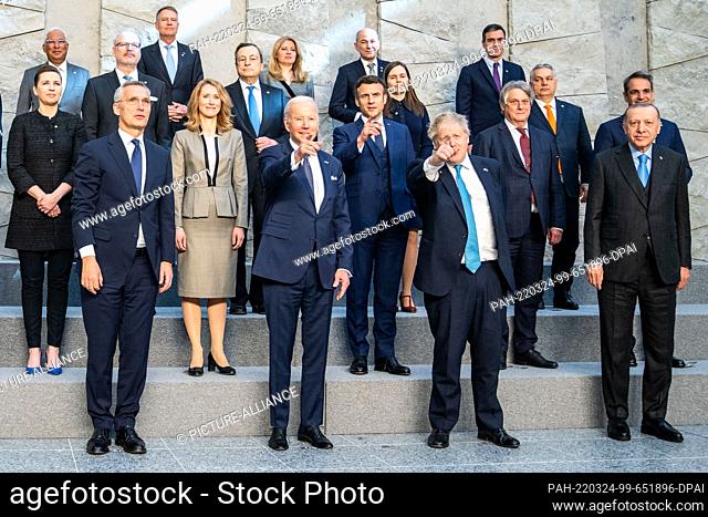 24 March 2022, Belgium, Brüssel: NATO heads of state and government stand for a family photo at NATO headquarters before the start of a special NATO summit