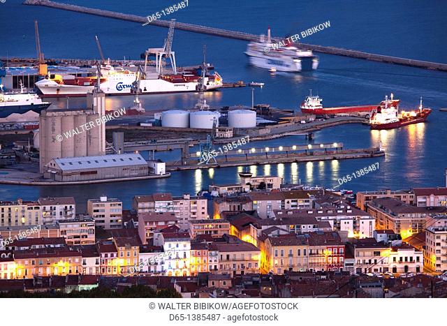 France, Languedoc-Roussillon, Herault Department, Sete, port overview from Mont St-Clair, dusk